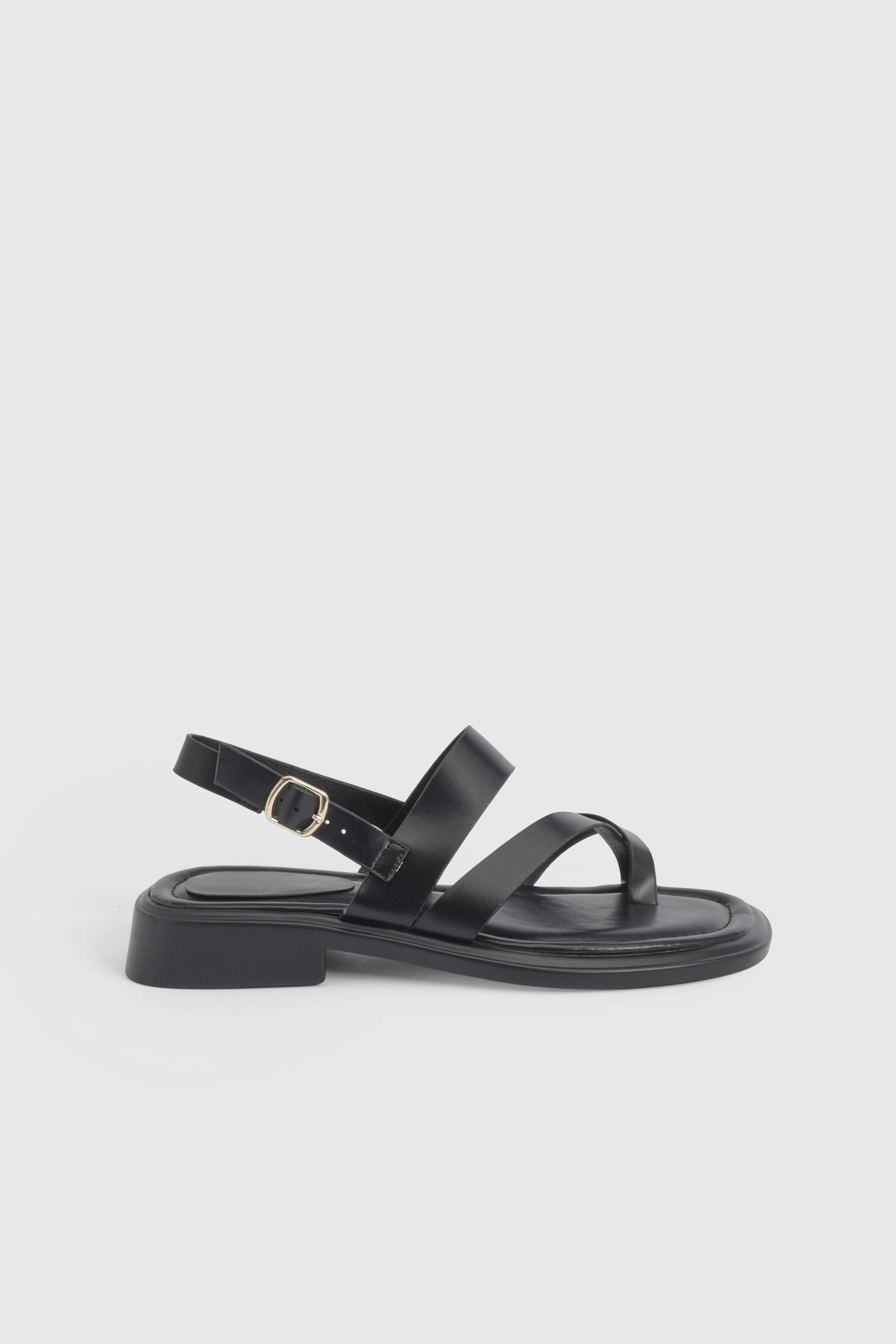 Faith: Isabelle Faux Leather Toe Loop Chunky Flat Sandals by FAITH