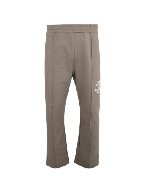 elasticated-waist track pants by FAMILY FIRST