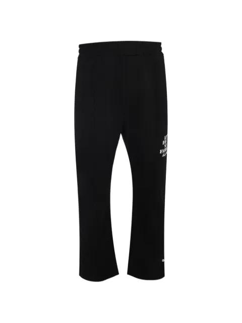 graphic track pants by FAMILY FIRST