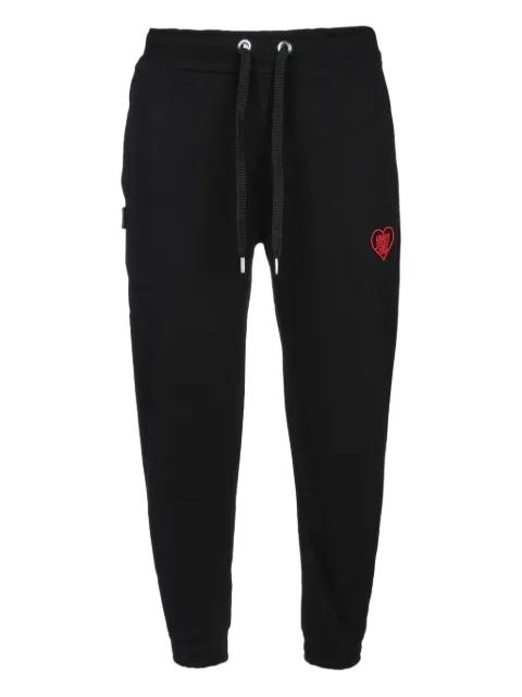 heart-embroidered track pants by FAMILY FIRST