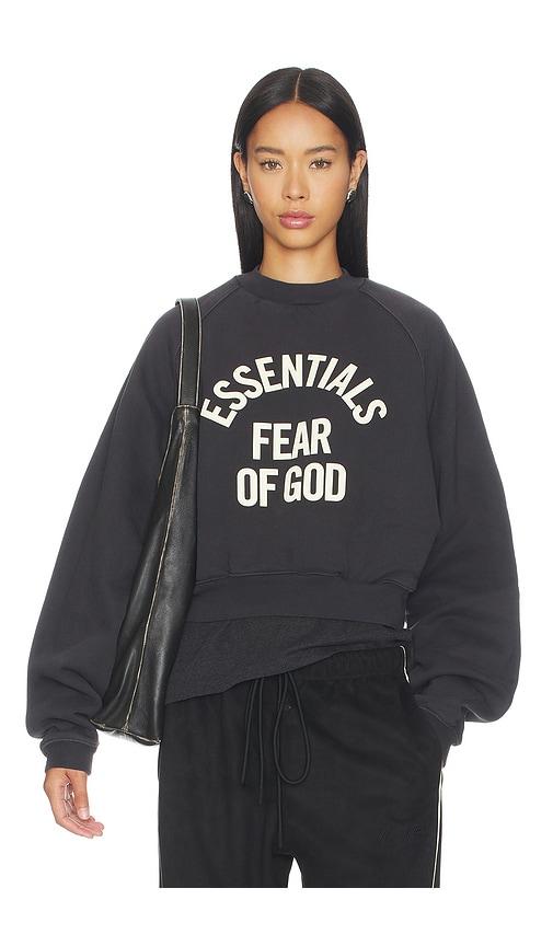 Fear of God ESSENTIALS Campus 90's Cropped Raglan Crewneck in Black by FEAR OF GOD