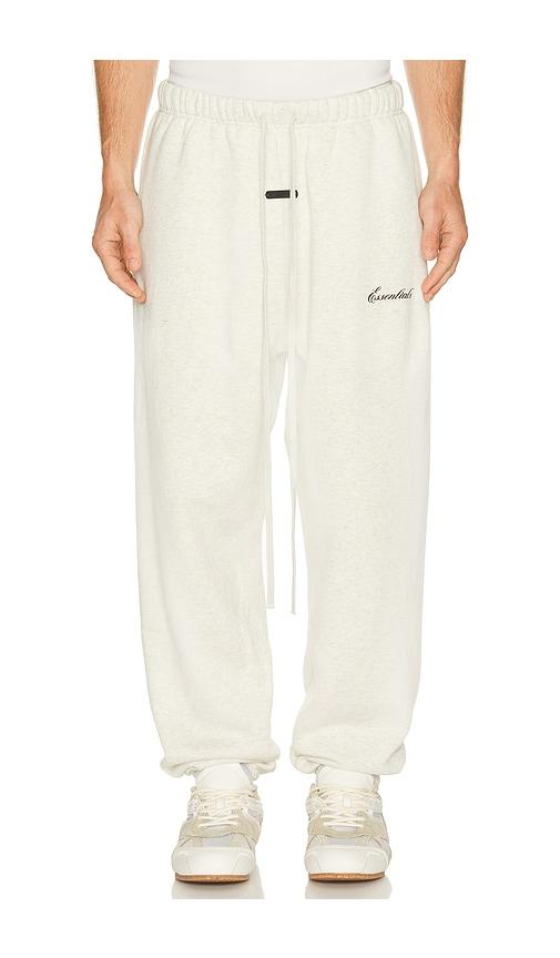 Fear of God ESSENTIALS Classic Sweatpant in Oatmeal Heather/Light Heather in Light Grey by FEAR OF GOD