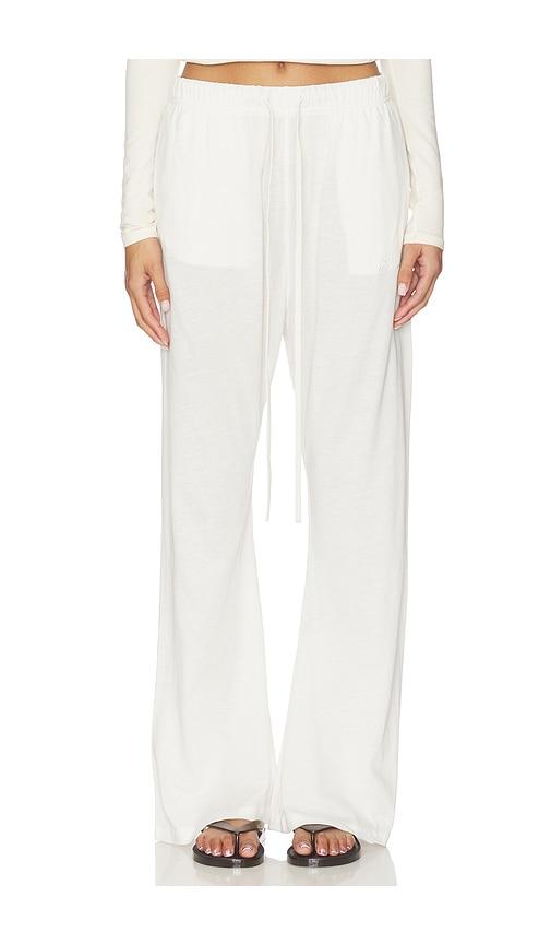 Fear of God ESSENTIALS Flare Pant in Ivory by FEAR OF GOD