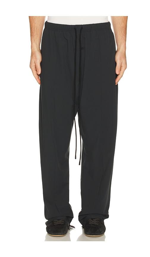 Fear of God ESSENTIALS Relaxed Track Pant in Black by FEAR OF GOD