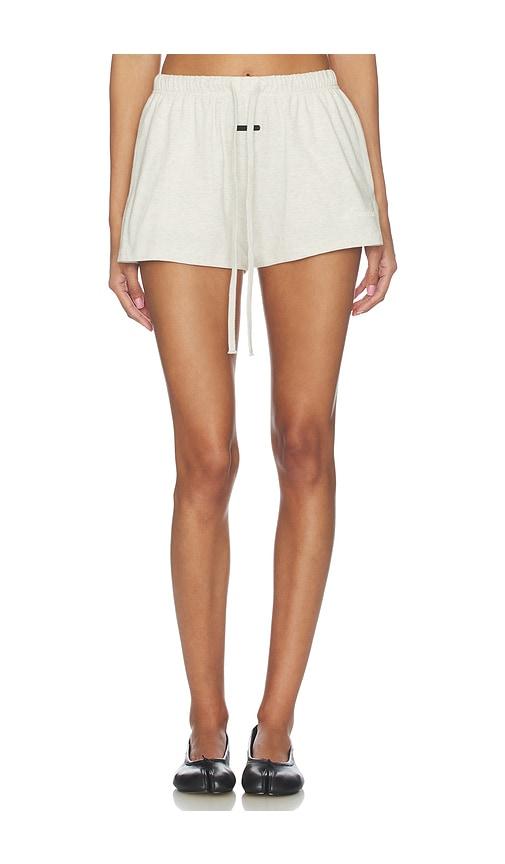 Fear of God ESSENTIALS Signature Running Short in Cream by FEAR OF GOD