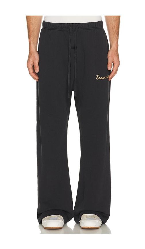 Fear of God ESSENTIALS Training Classic Fit Flare Sweatpant in Black by FEAR OF GOD