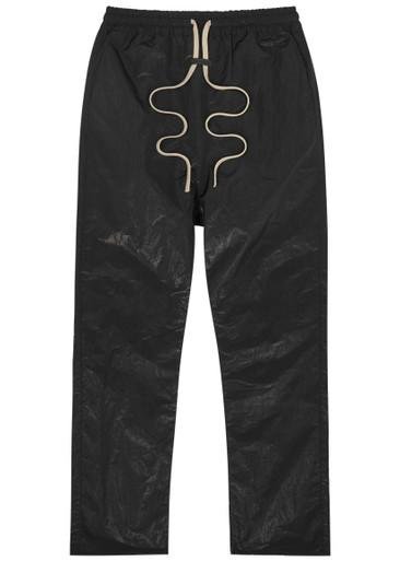 Forum coated shell sweatpants by FEAR OF GOD