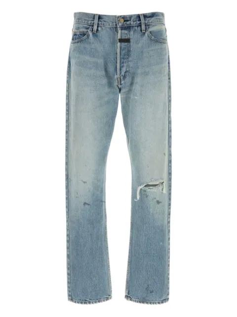 distressed light-wash jeans by FEAR OF GOD