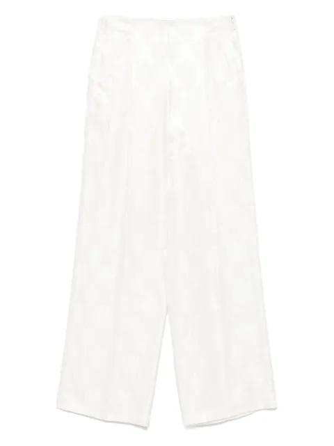 floral-jacquard trousers by FENDI