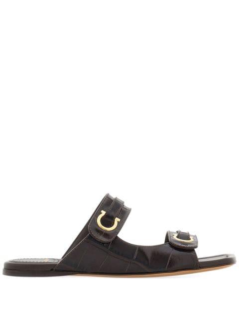 Gancini-plaque leather slides by FERRAGAMO