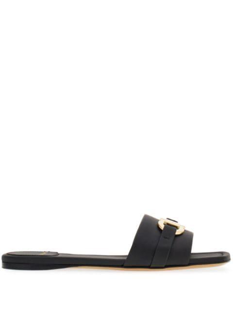 Gancini-plaque leather slides by FERRAGAMO