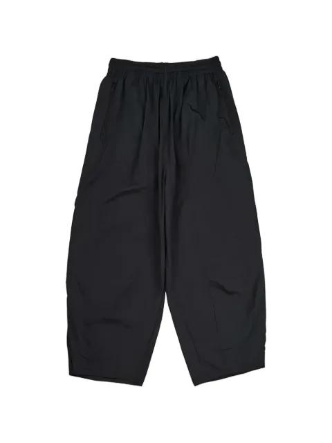 Enigma elasticated-waistband track pants by FFFPOSTALSERVICE