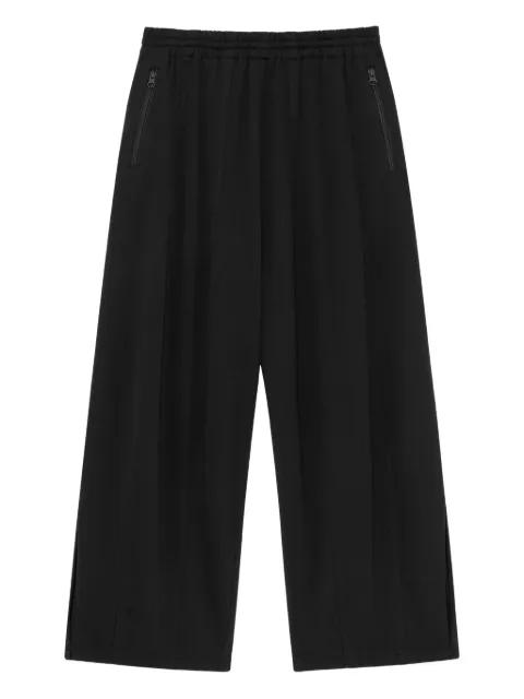zip-pockets trousers by FFFPOSTALSERVICE