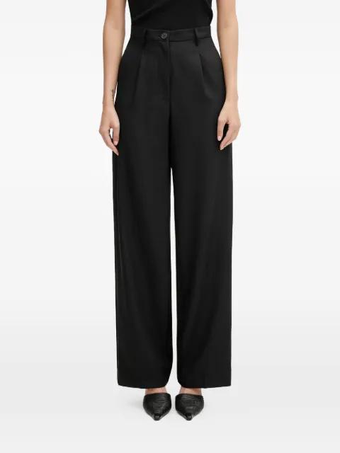 button pleated trousers by FIORUCCI