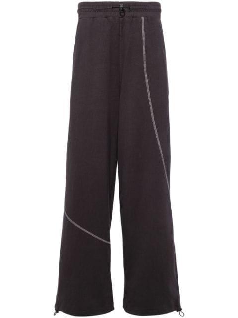 curve-seam cotton track pants by FIVE CM
