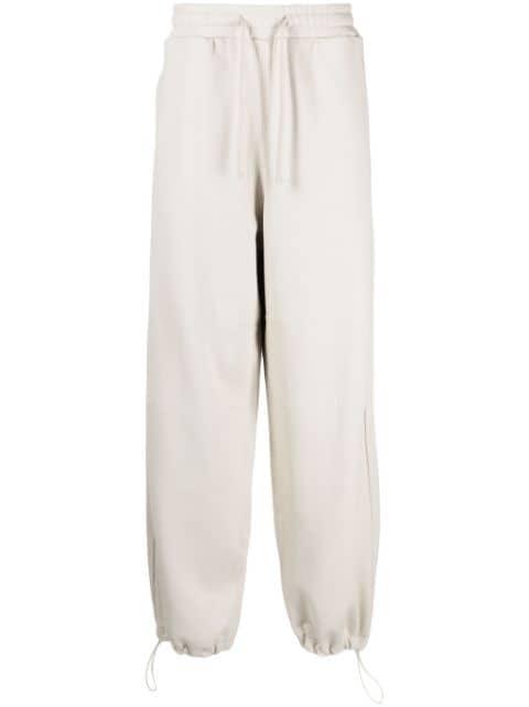 logo-appliqué cotton track pants by FIVE CM