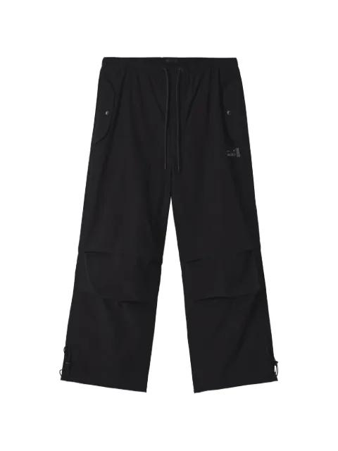 logo-print trousers by FIVE CM