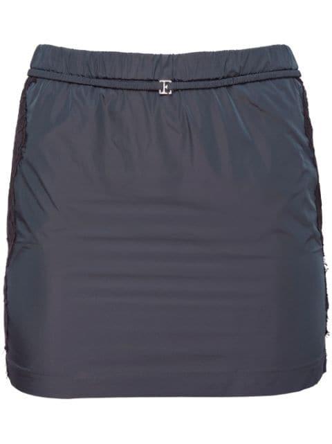 nylon mini skirt by FLEUR DU MAL