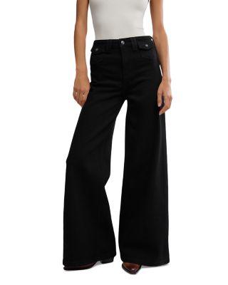 Kellee High Rise Palazzo Jeans in Black Eyelet by FREE PEOPLE