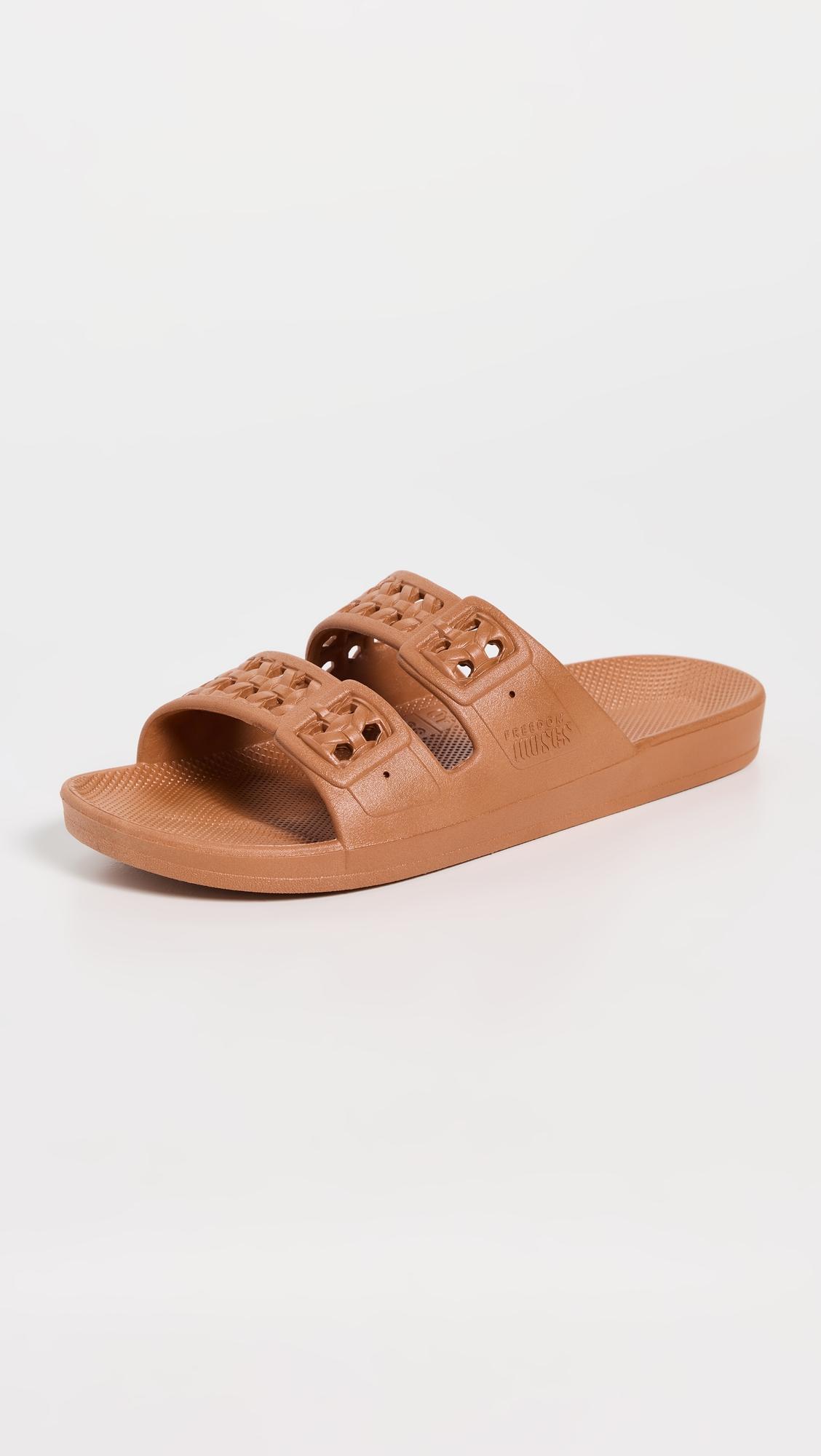 Paz Slides by FREEDOM MOSES