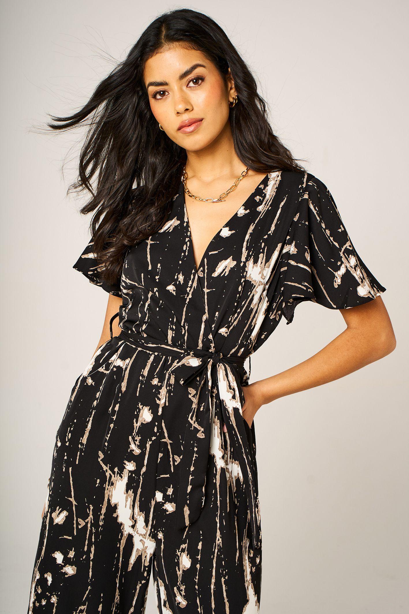Abstract Pattern Wrap Top Jumpsuit with Wide Leg In Black by FS COLLECTION