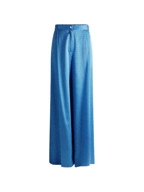 button-fastening pants by FUSALP