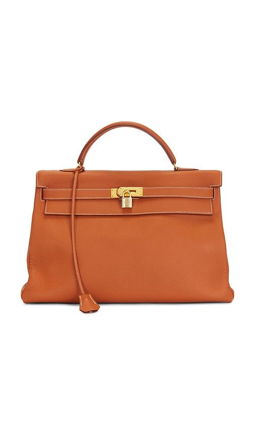 FWRD Renew Hermes Taurillon Clemence Kelly 40 Handbag in Brown by FWRD RENEW