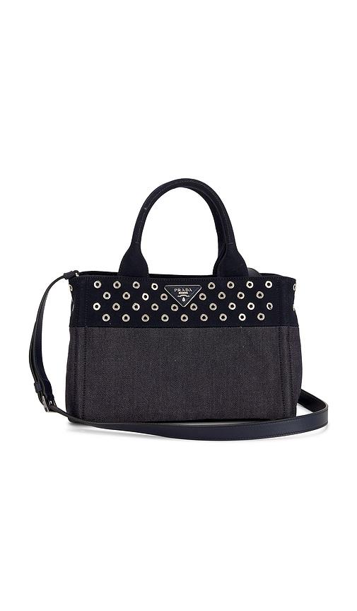 FWRD Renew Prada Studded Denim Canapa Tote Bag in Blue by FWRD RENEW