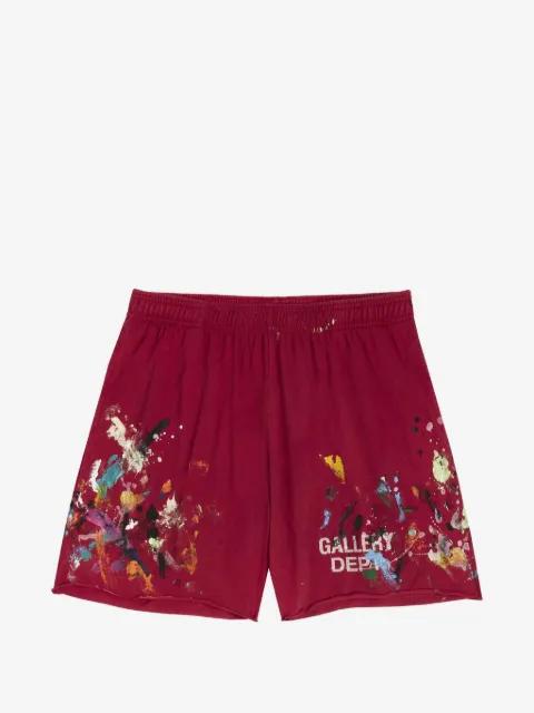 paint-splatter logo-print shorts by GALLERY DEPT.