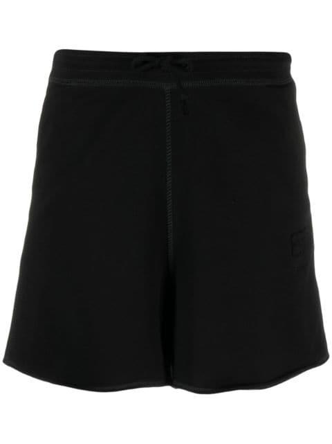 logo-patch short shorts by GANNI
