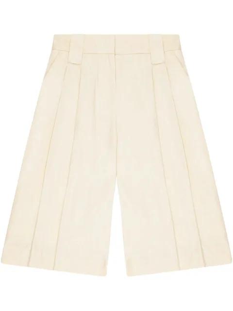 pleat-detail shorts by GANNI