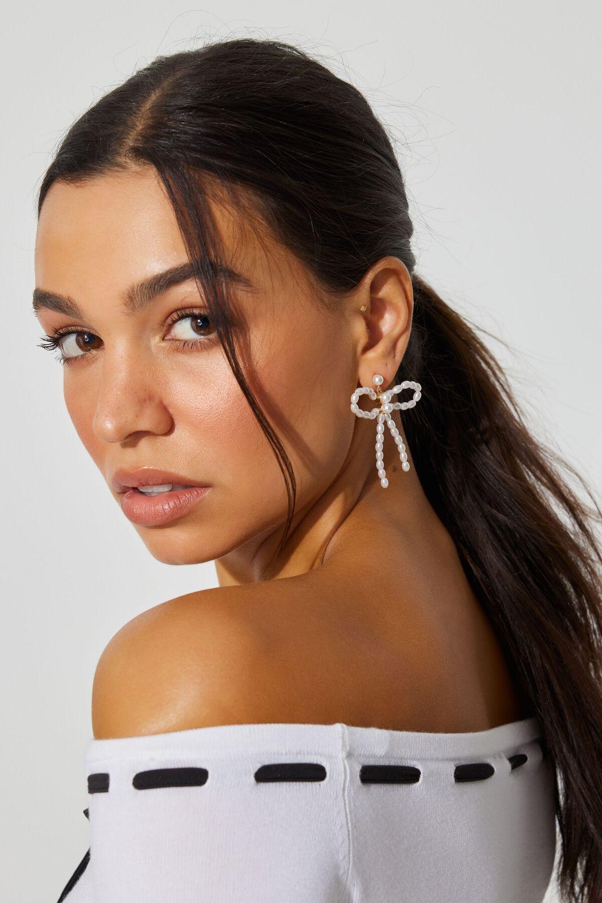 Bow Pearl Earrings by GARAGE