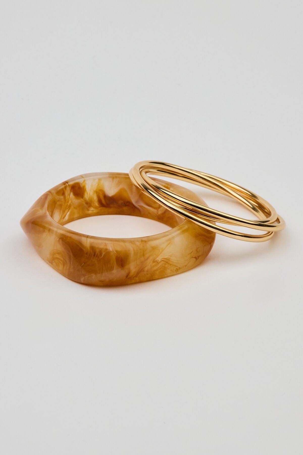 Set of 4 Resin & Clean Twist Bangles by GARAGE