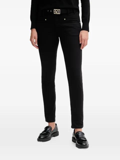 belt-embellishment jeans by GAUDI