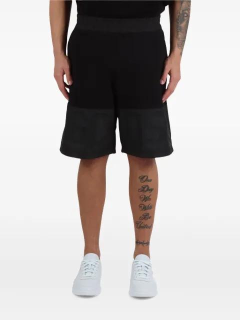 cotton track shorts by GCDS