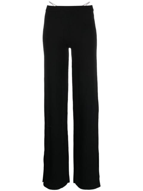 crystal-thong flared trousers by GCDS