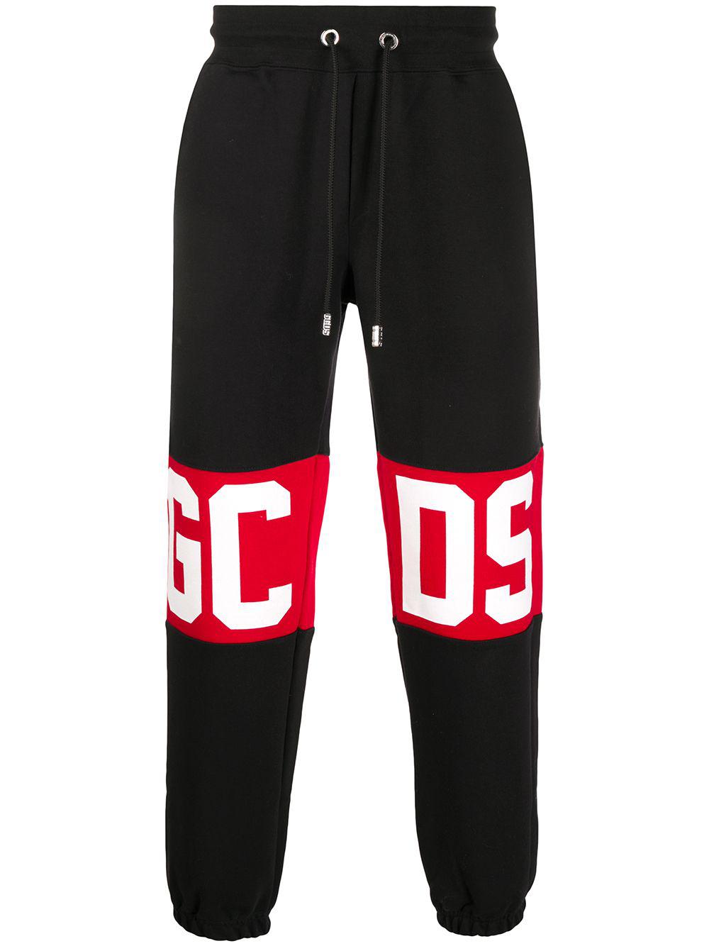 logo print track pants by GCDS