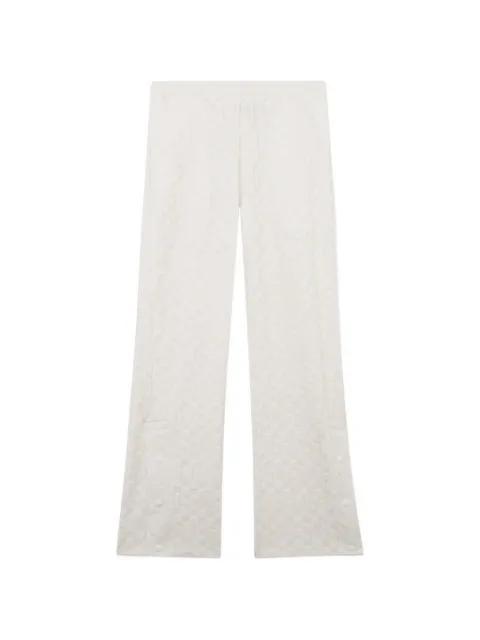 monogram-pattern trousers by GCDS