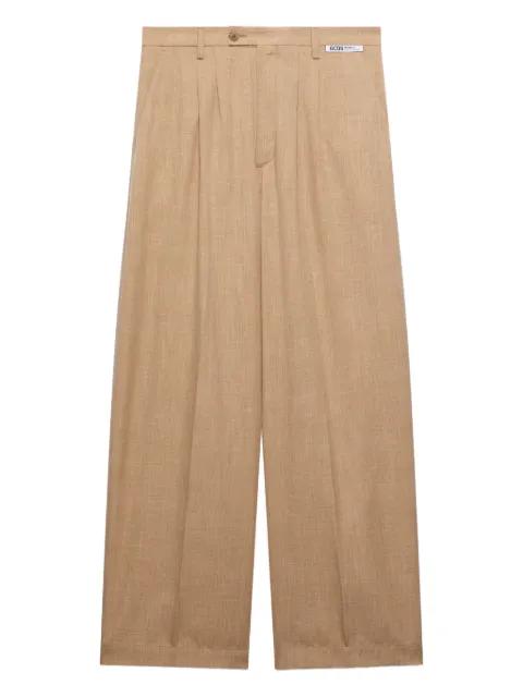 pleated trousers by GCDS