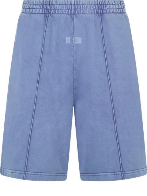 stone-washed track shorts by GCDS