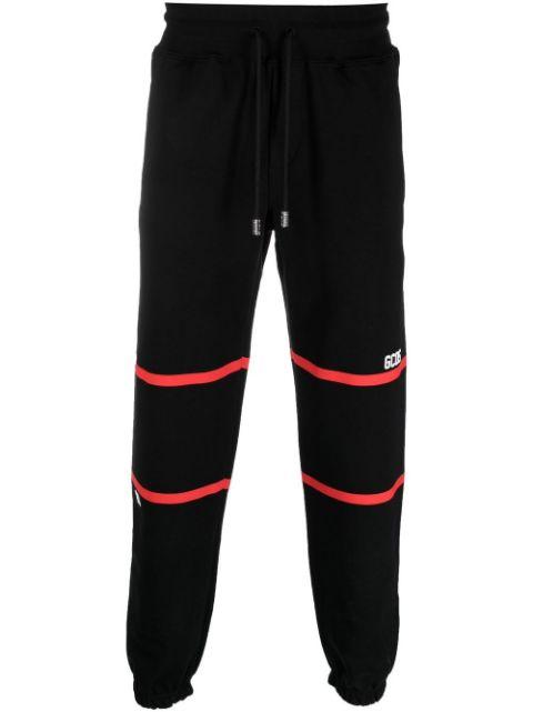 striped cotton track pants by GCDS