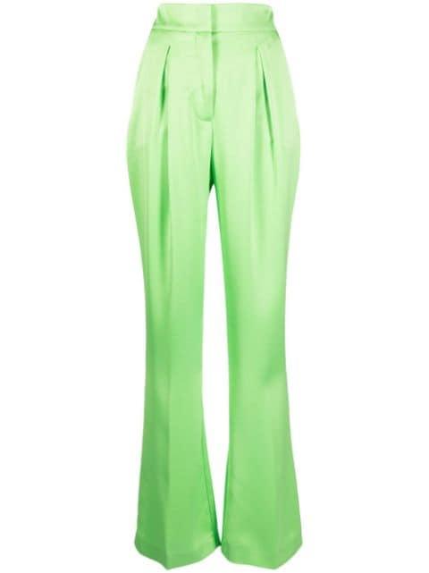 pleat-detail flared trousers by GENNY