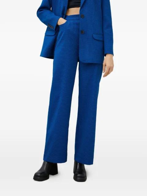 pocket houndstooth trousers by GESTUZ