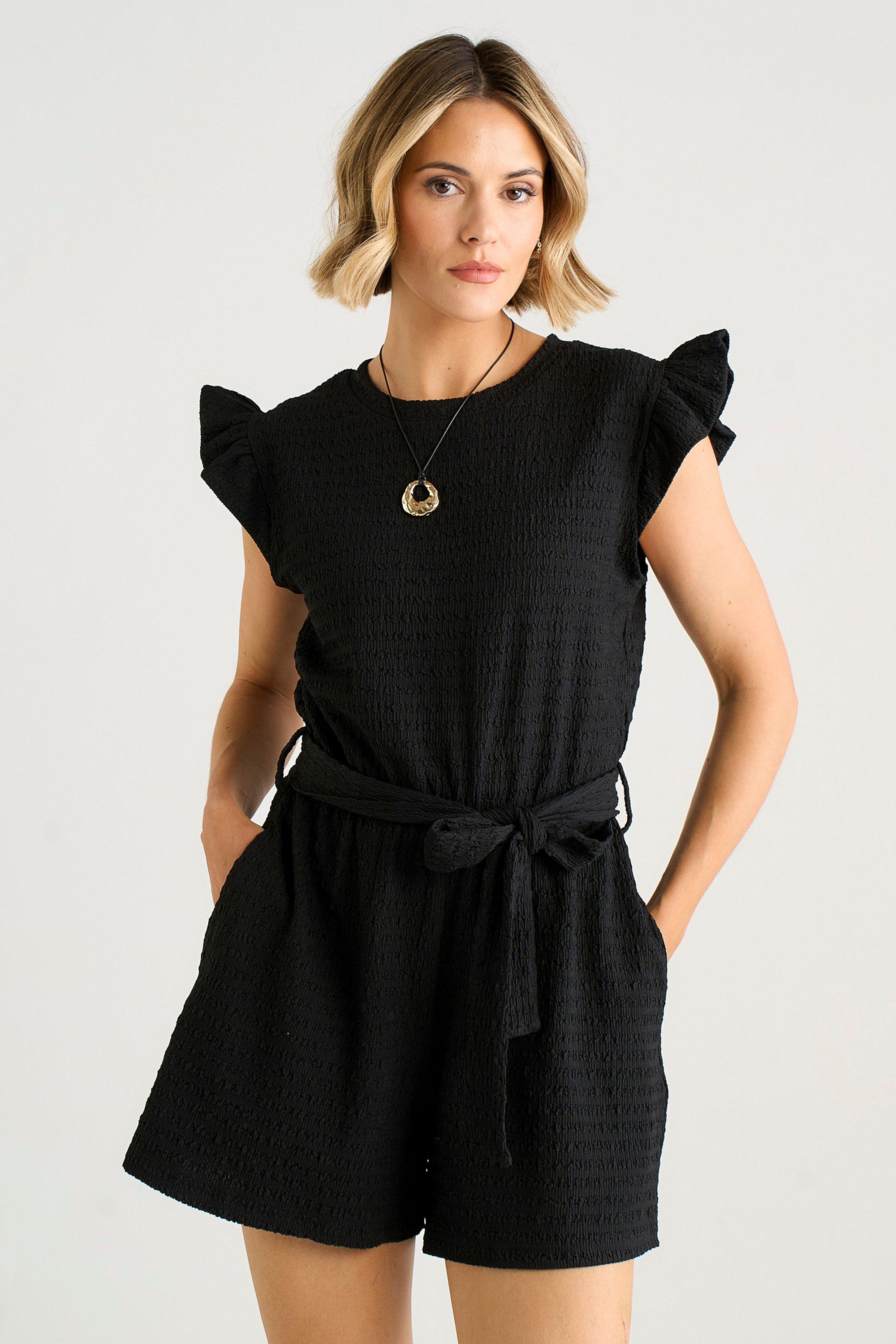 Black Stretch Texture Frill Elasticated Waist Playsuit by GINI LONDON