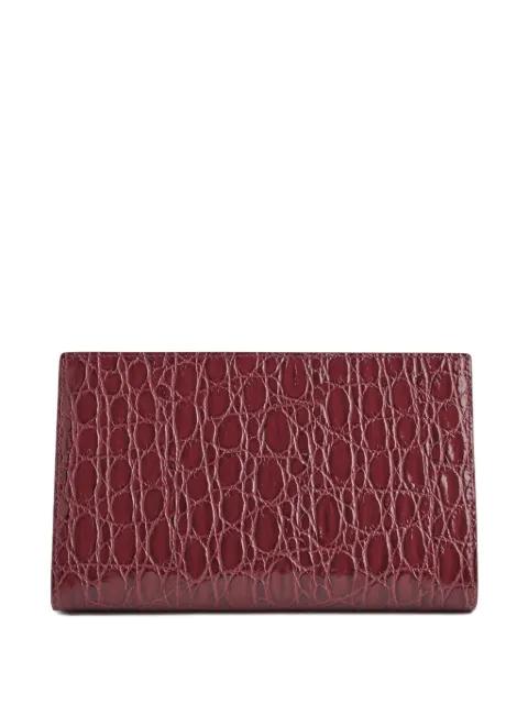 crocodile-embossed clasp clutch by GIUSEPPE ZANOTTI