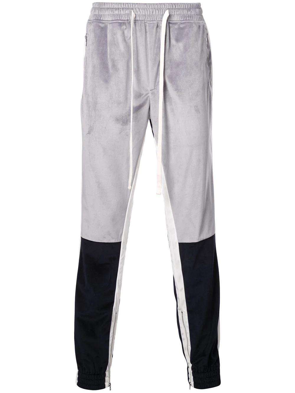 Varsity track pants by GOD'S MASTERFUL CHILDREN