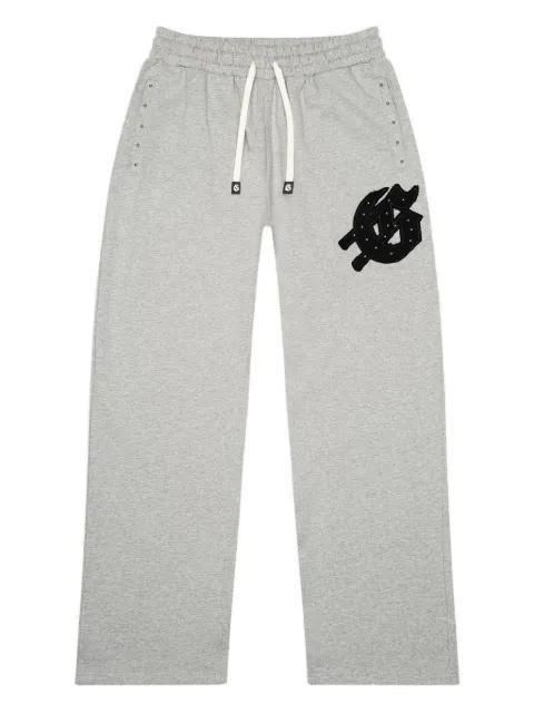 Symmetric Studded track pants by GODSPEED