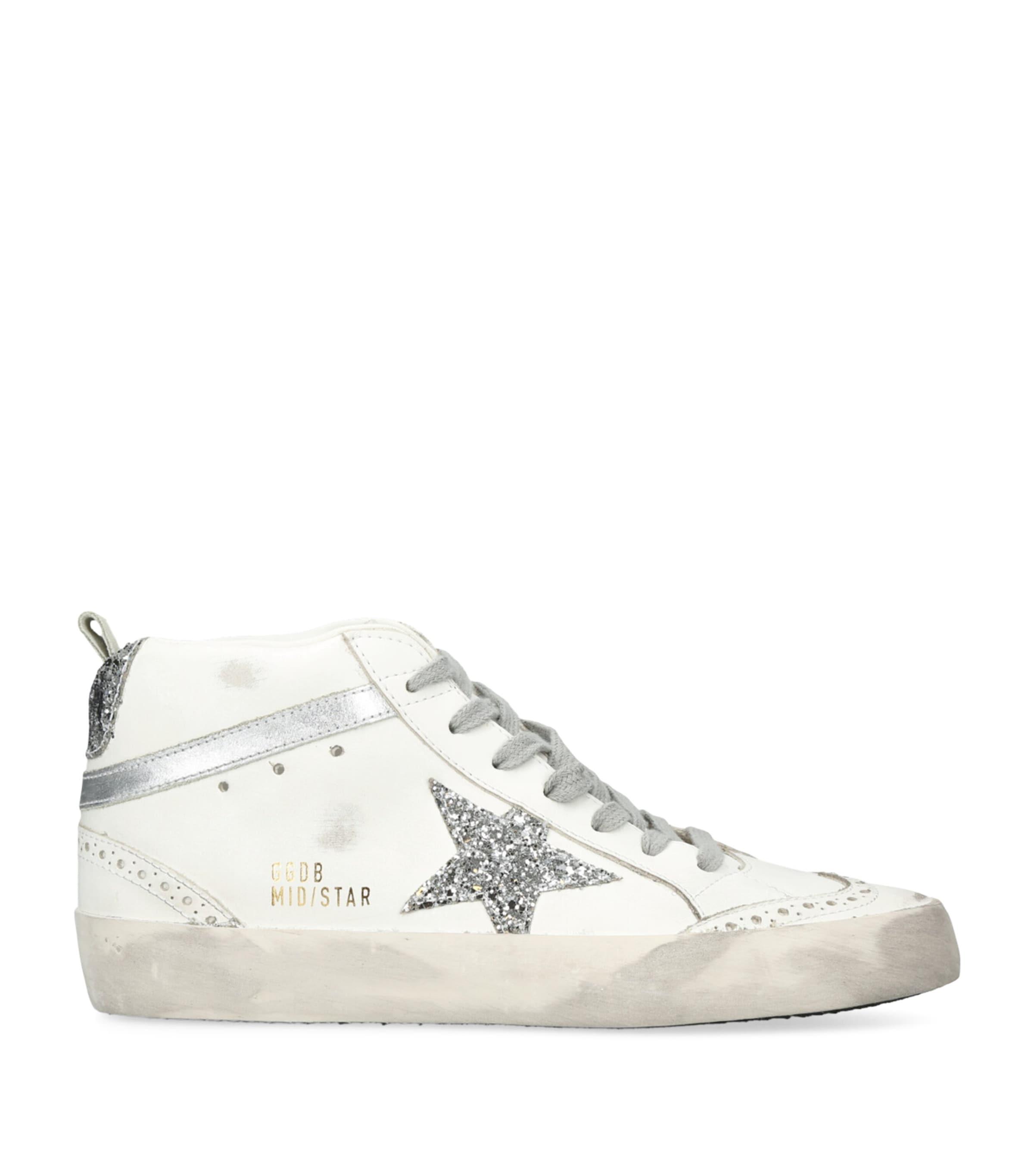 Golden Goose Leather Mid Star Sneakers by GOLDEN GOOSE