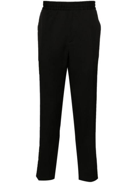 logo-plaque virgin wool trousers by GOLDEN GOOSE