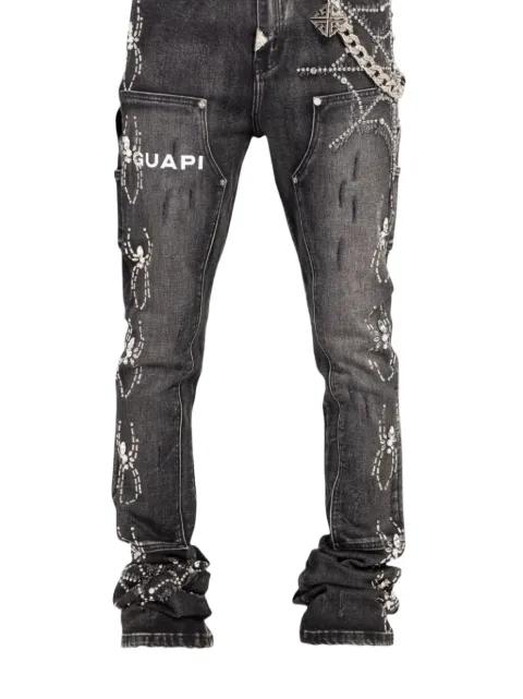 crystal-embellished spider-motif jeans by GUAPI